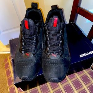 Black and Red sneakers Pumas